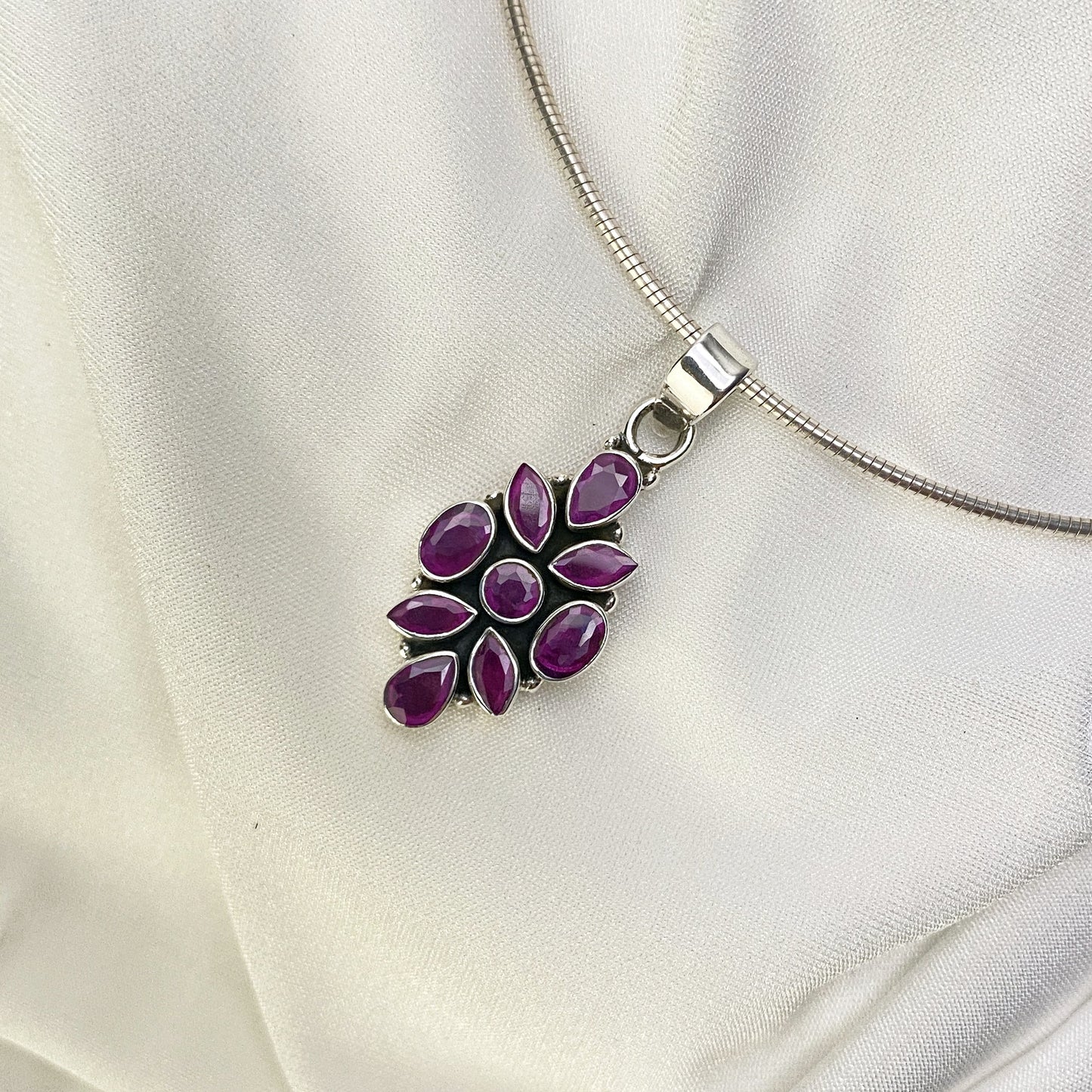 Floral Purple Zircon Pendant